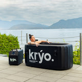 Kryo Plunge Cold Plunge, front side of the cold plunge, showing the Kryo cold plunge Tub and Kryo Water Chiller with a beautiful background of the ocean and mountains